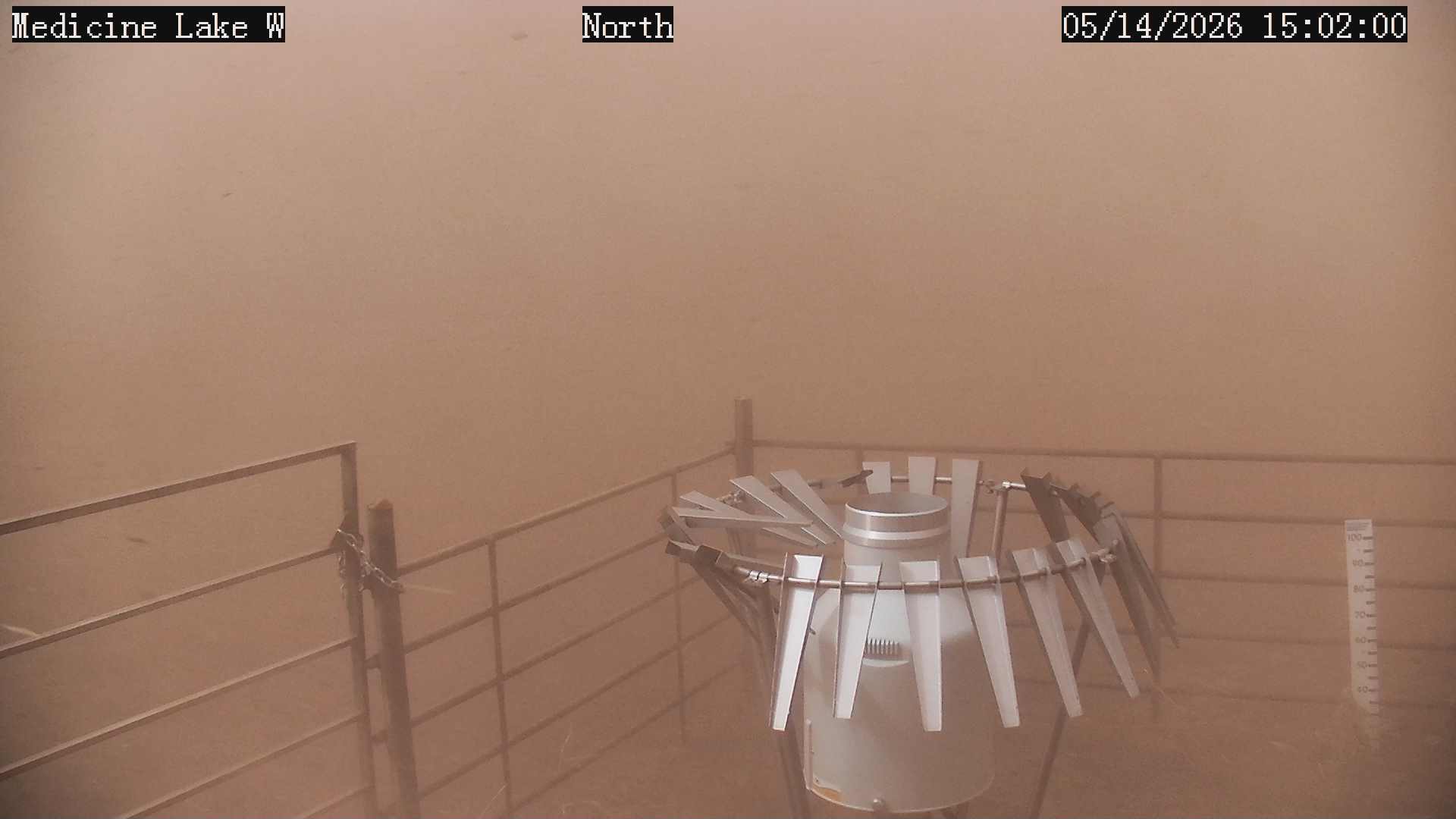 Photo of rain gauge at the Medicine Lake Montana Mesonet station.